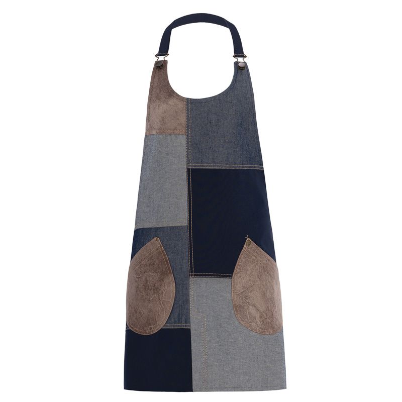 Grembiule da cucina patchwork con tasche a contrasto in tessuto blu e marrone, design moderno e funzionale.